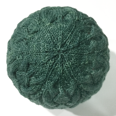 Crown of green knitted lace hat