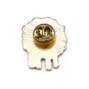 Back of white, teal, yellow and red enamel on gold toned metal sheep pin by Pretty Warm Designs