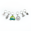 Set of one two-toned green and silver enamel tiny camper and five antiqued silver camping themed stitch markers for knitting by Pretty Warm Designs