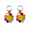 Two yellow and rainbow petal enamel happy face flower charms snag free ring stitch markers  for knitting by Pretty Warm Designs
