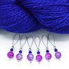 Set of six pink and lavender crackle glass beads, blue bicone crystal beads, perforated silver beads, silver accents on wire stitch markers with yarn for knitting by Pretty Warm Designs