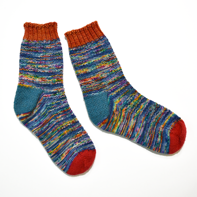Hand knitted socks by Janet Rice-Bredin using Erica Lueder's Hermione's Everyday Sock stitch pattern and Hedgehog Fibre Sock Kimono
