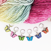 Set of six enamel butterfly charm crochet locking stitch markers in red, yellow, green, blue, pink and purple for crochet by Pretty Warm Designs