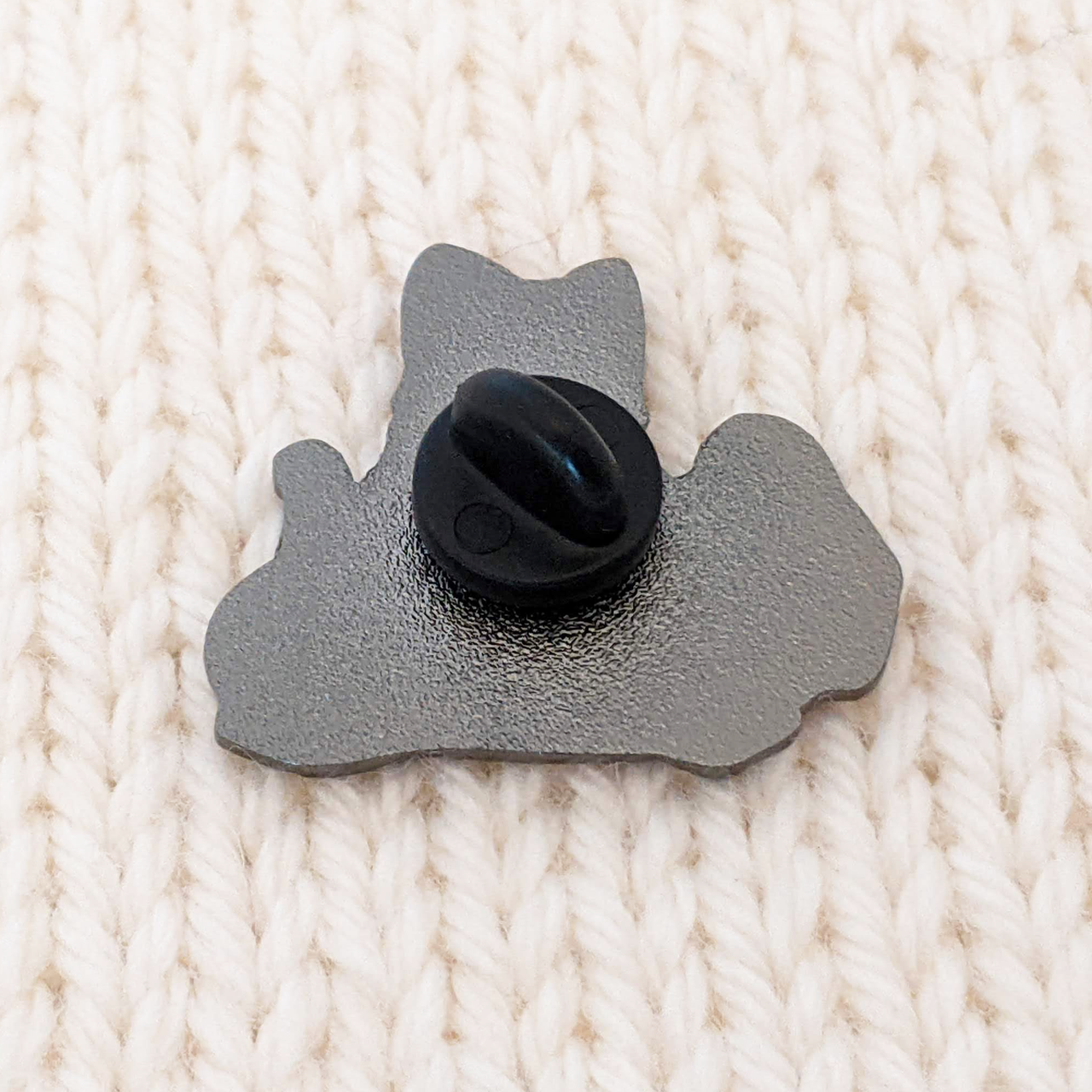 back of calico kitty enamel pin