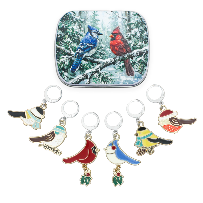 Six Christmas bird stitch markers on leverback clasps with a winter bird tin