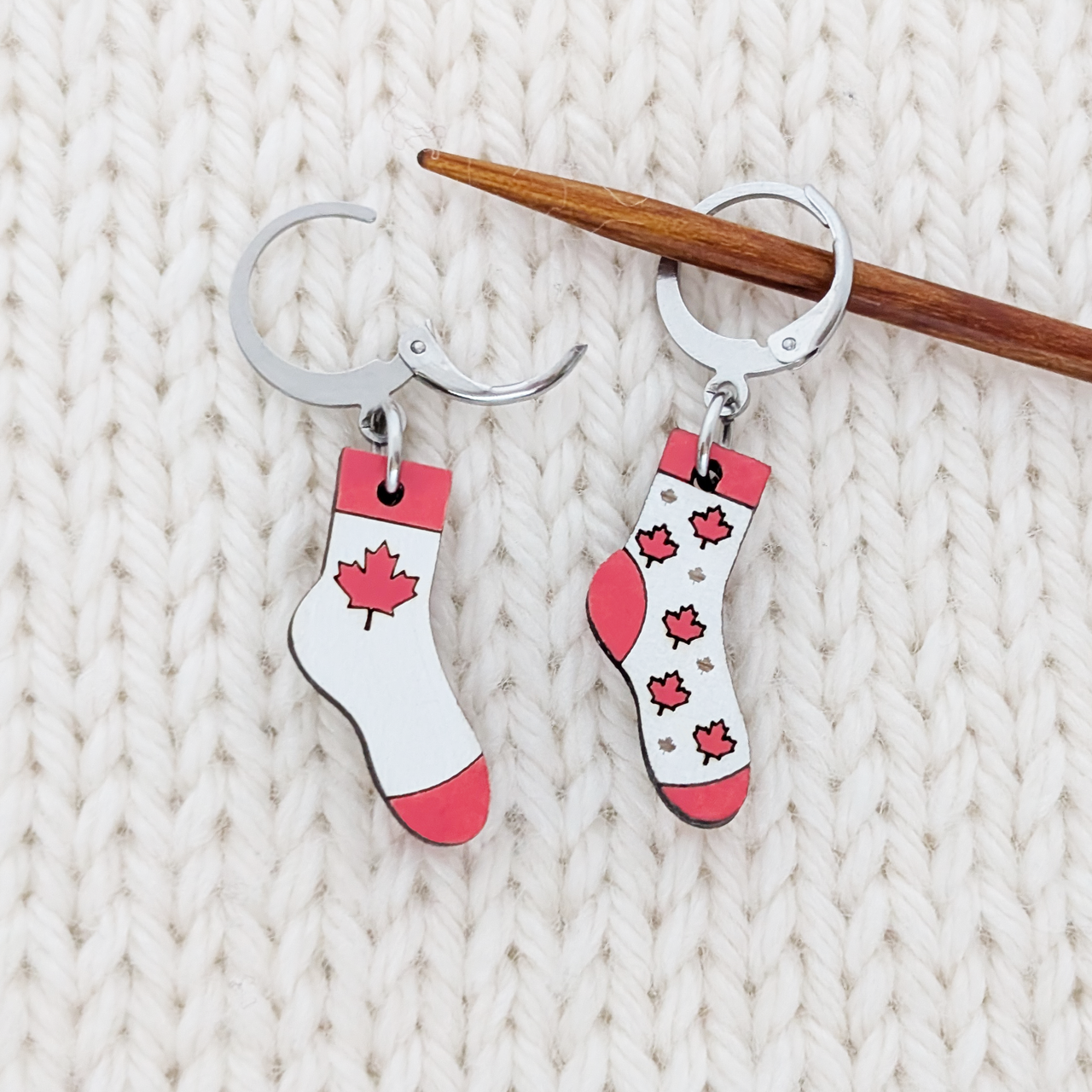 Canada Flag Locking Sock Stitch Markers for Crochet or Knitting, shown on Knitting needle and with open clasp.