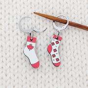 Canada Flag Locking Sock Stitch Markers for Crochet or Knitting, shown on Knitting needle and with open clasp.