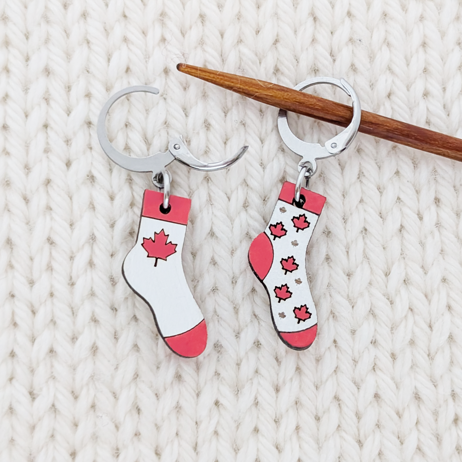 Canada Flag Locking Sock Stitch Markers for Crochet or Knitting, shown on Knitting needle and with open clasp.