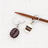 Coffee Cup and Java Bean stitch markers for crochet or knitters, shown on knitting needle.