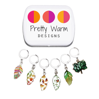 Set of 6 locking stitch markers with storage tin in Summer Leaves theme for crochet or knitting by Pretty Warm Designs