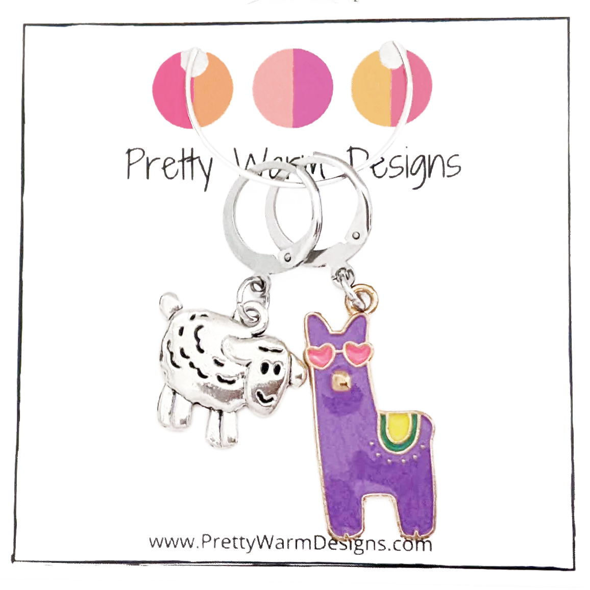 Purple enamel llama crochet stitch marker with pink heart eyes and yellow and green accents plus antique silver lamb locking crochet stitch marker attached with a silver hoop to cardstock with Pretty Warm Designs logo and URL sold by Pretty Warm Designs Inc.