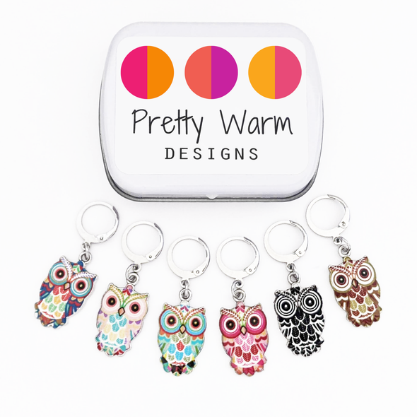 Set of six multicoloured enamel on silver toned alloy owl locking stitch markers with decorative tin for crochet by Pretty Warm Designs