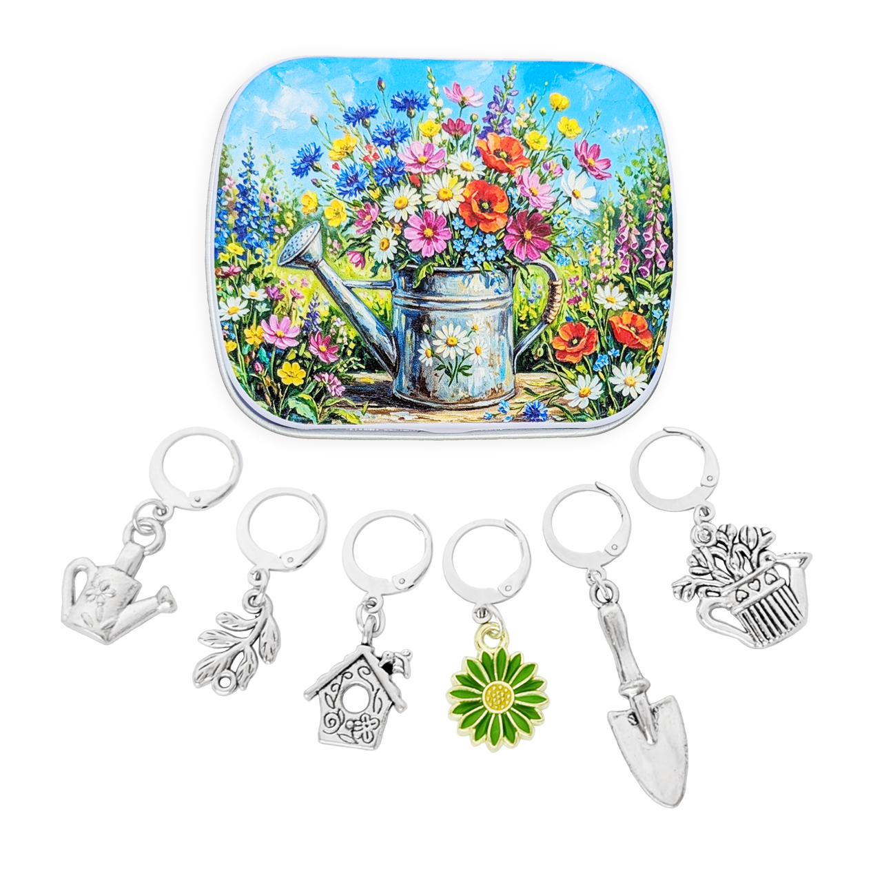 A square metal tin with rounded corners featuring a colorful illustration of a watering can and wildflowers, displayed above six silver-tone gardening-themed locking stitch markers for knitting or crochet on a white background.