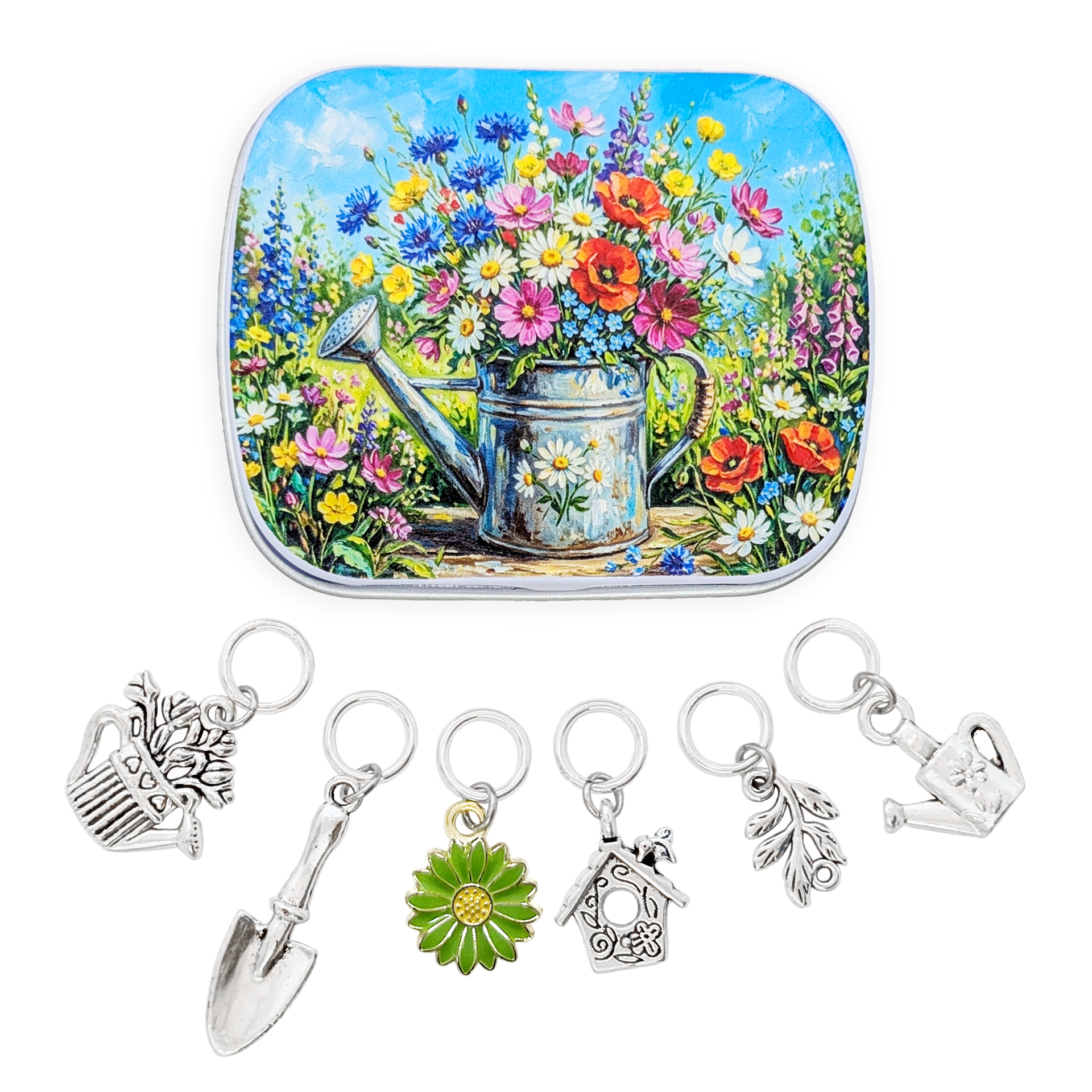 A square tin with rounded corners featuring a colorful illustration of a watering can filled with wildflowers, displayed above six small silver-toned ring style stitch markers for knitters, with metal charms shaped like a watering can, trowel, flower, birdhouse, planter and leaf on a white background.