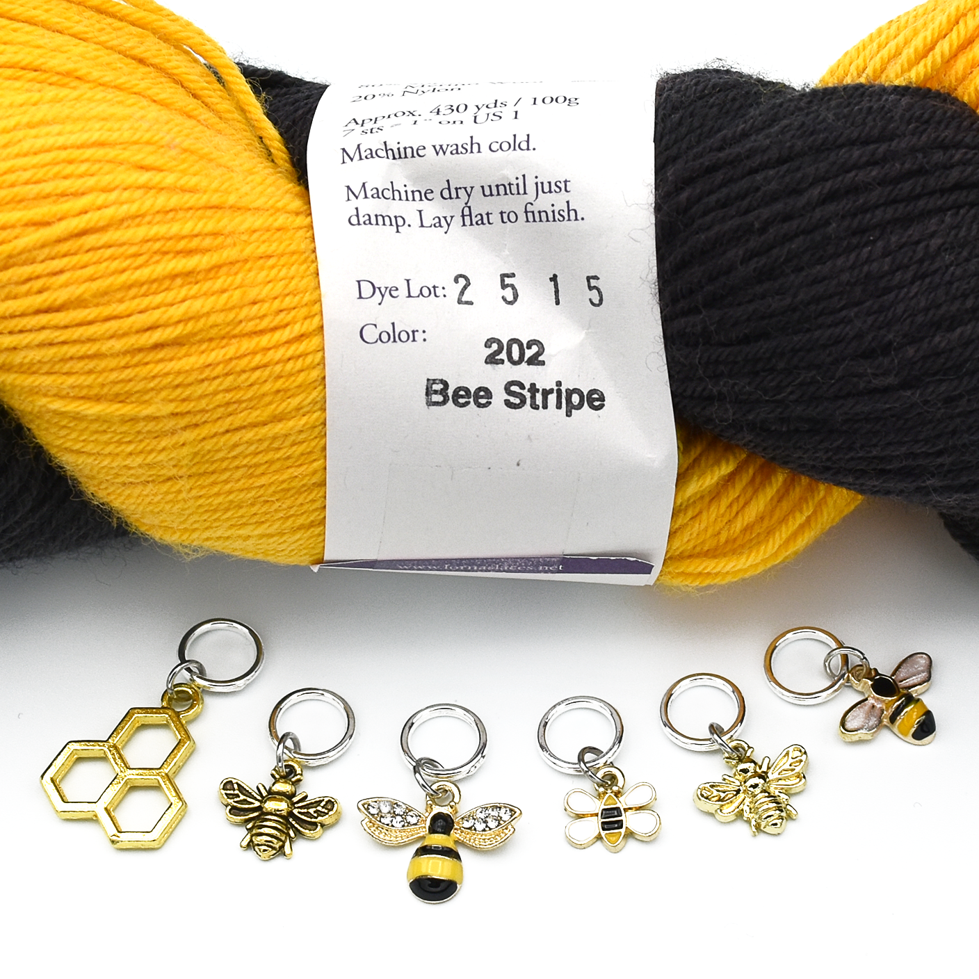 Set of six gold toned bee themed charms snag free ring stitch markers with yarn for knitting by Pretty Warm Designs
