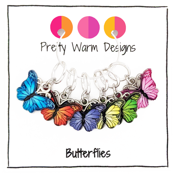 Set of 6 multicolored butterfly theme ring stitch markers for knitting by Pretty Warm Designs