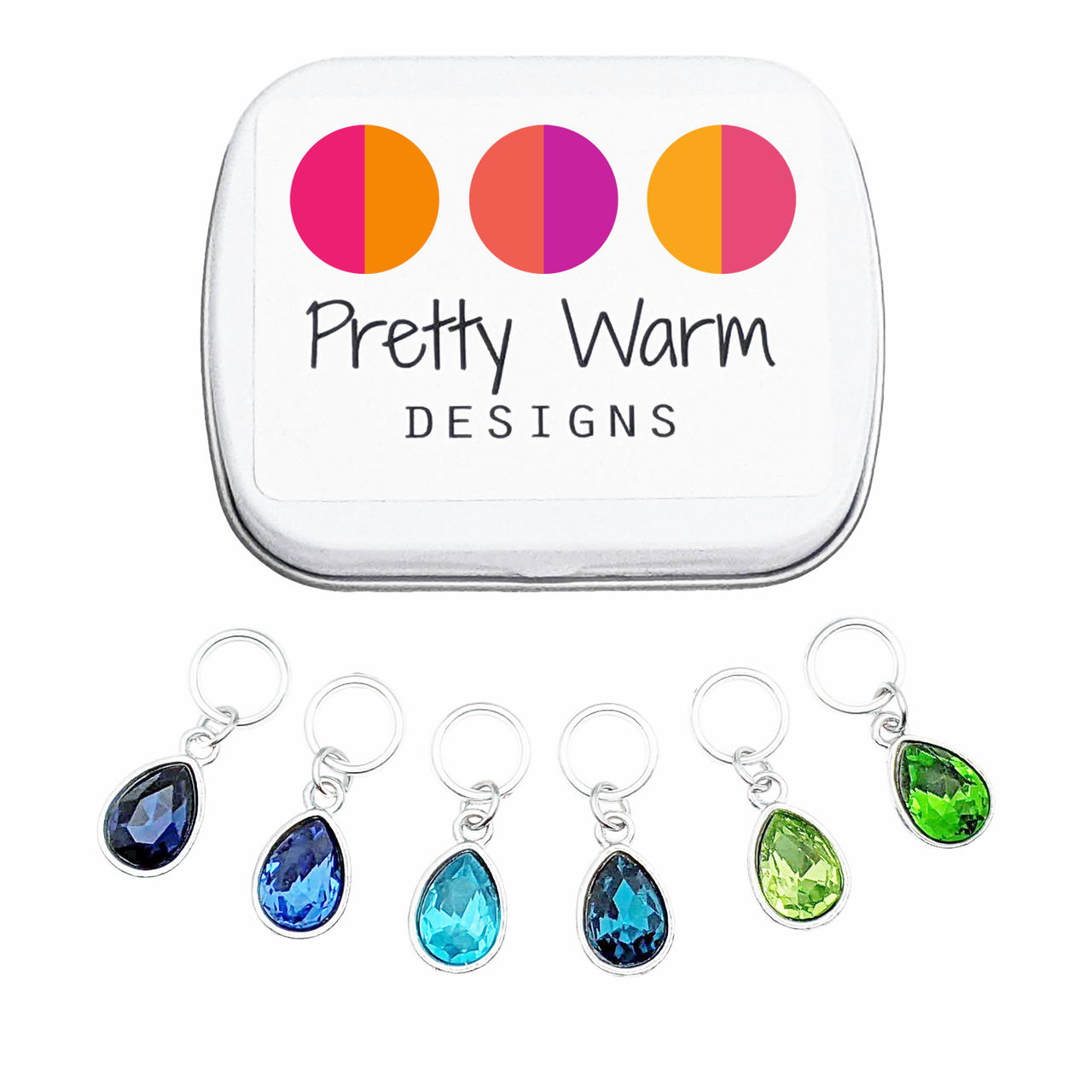 Ocean Waters stitch markers set of 6 with storage tin, in shades of blue and green. Ring style for knitting.