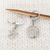 Angel and Nativity Scene Crochet Stitch Marker Duo by Pretty Warm Designs