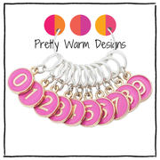Set of 10 numbered stitch markers with charms numbering 0 - 9 on smooth snag free closed rings for knitters