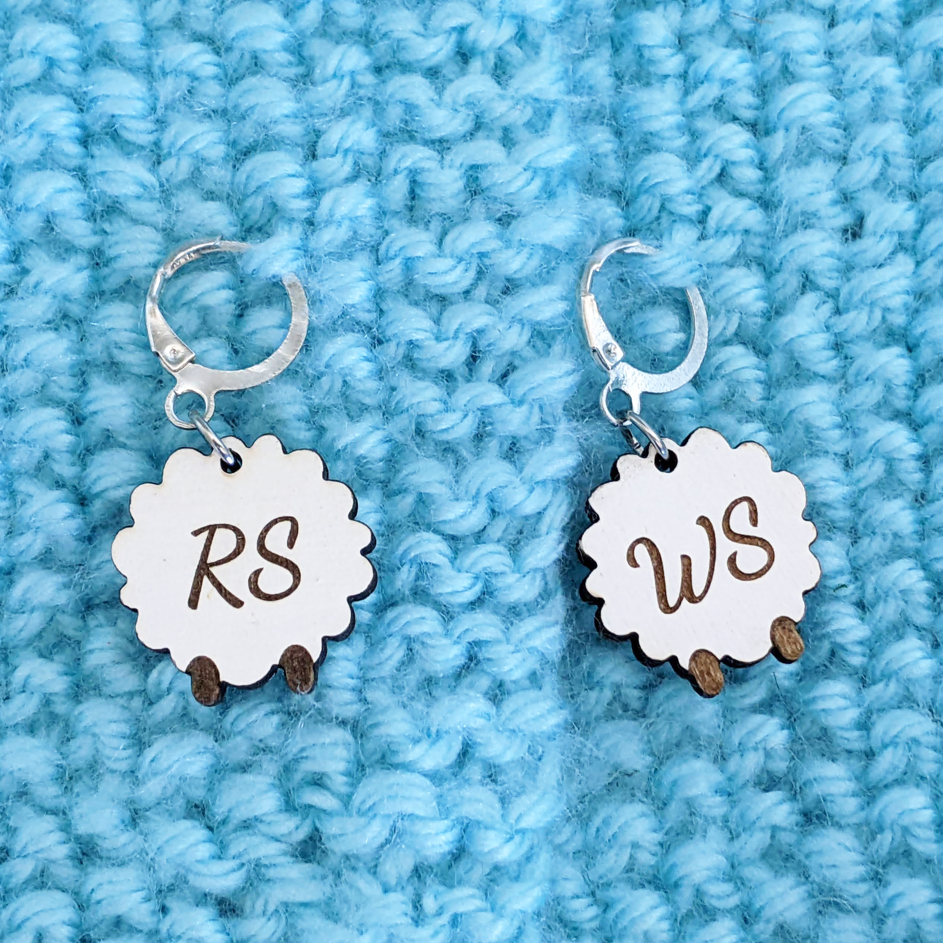 Back side of silly sheep RS/WS stitch marker duo set