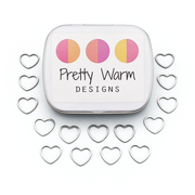 Set of fifteen heart silver toned ring stitch markers with tin for knitting by Pretty Warm Designs