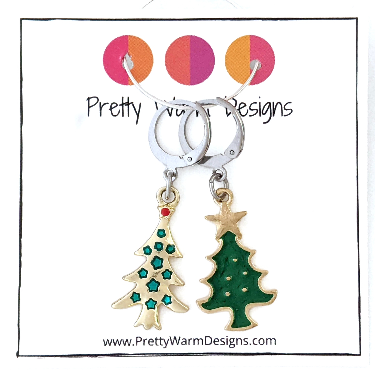 Two Christmas tree stitch markers on leverback clasps, one green with gold edging and one gold with stars