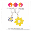 Two enamel charm crochet locking stitch markers with one yellow and one blue daisy with Pretty Warm Designs text and logo