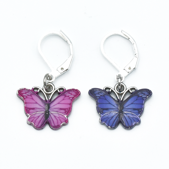 Two enamel butterfly charm crochet locking stitch markers in pink and purple for crochet by Pretty Warm Designs