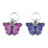 Two enamel butterfly charm snag free ring stitch markers in pink and purple for knitting by Pretty Warm Designs