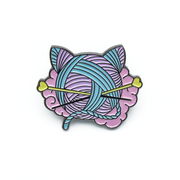 Pink, turquoise and yellow enamel on black background cat shaped yarn knitting pin by Pretty Warm Designs