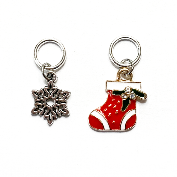 One red, white and green enamel with rhinestones Christmas stocking ring stitch marker and one silver alloy snowflake ring stitch marker for knitting by Pretty Warm Designs