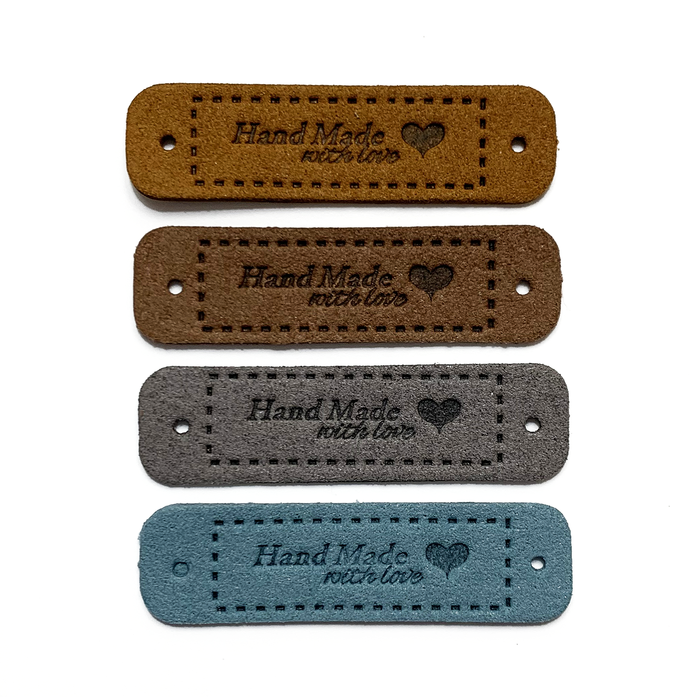 Four medium brown, dark brown, grey and teal coloured PU polyurethane vegan leather garment label tags for knitted and crocheted items sold by Pretty Warm Designs Inc.