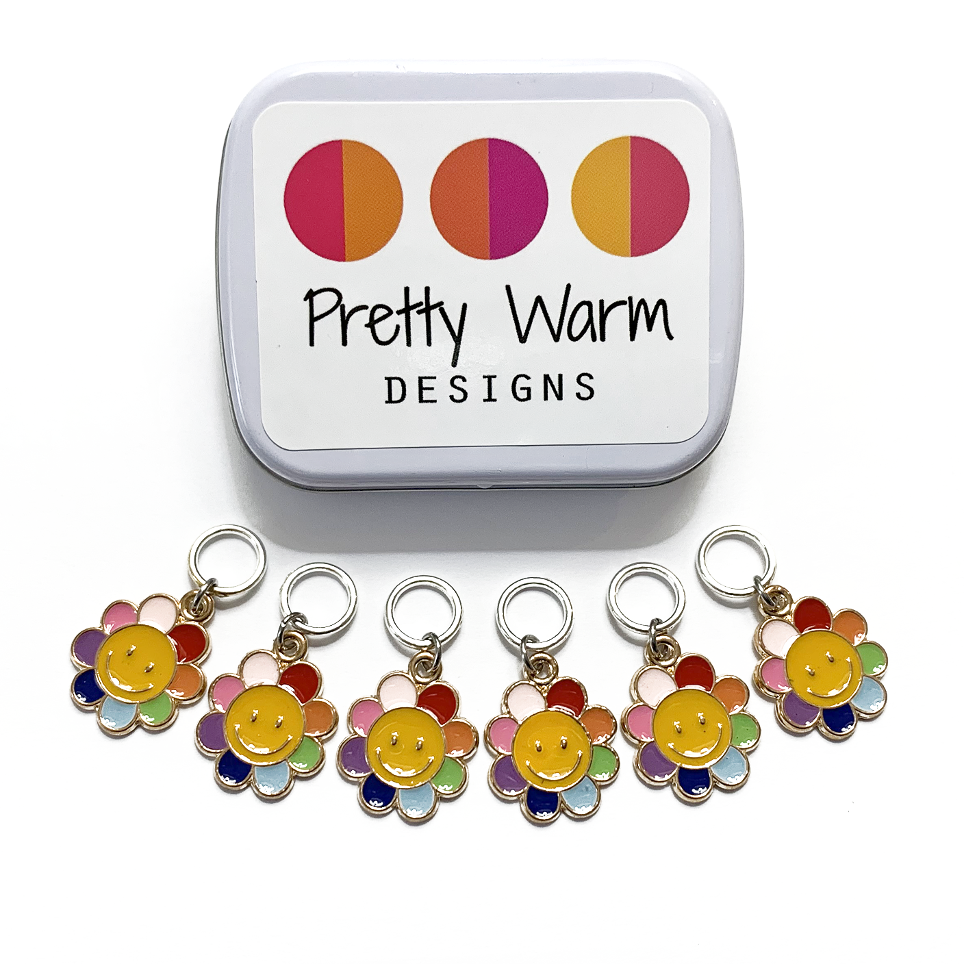 Set of six yellow and rainbow petal enamel happy face flower charms snag free ring stitch markers with decorative tin for knitting and logo by Pretty Warm Designs