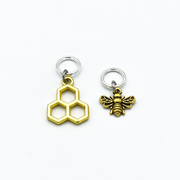 Gold toned honeycomb and bee charms snag free ring stitch markers for knitting by Pretty Warm Designs