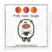 White and multicoloured enamel on black background sweater knitting sheep brooch pin by Pretty Warm Designs