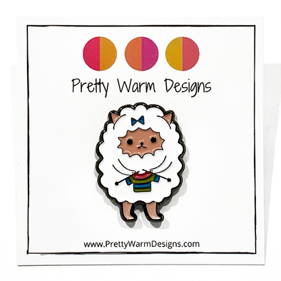 White and multicoloured enamel on black background sweater knitting sheep brooch pin by Pretty Warm Designs