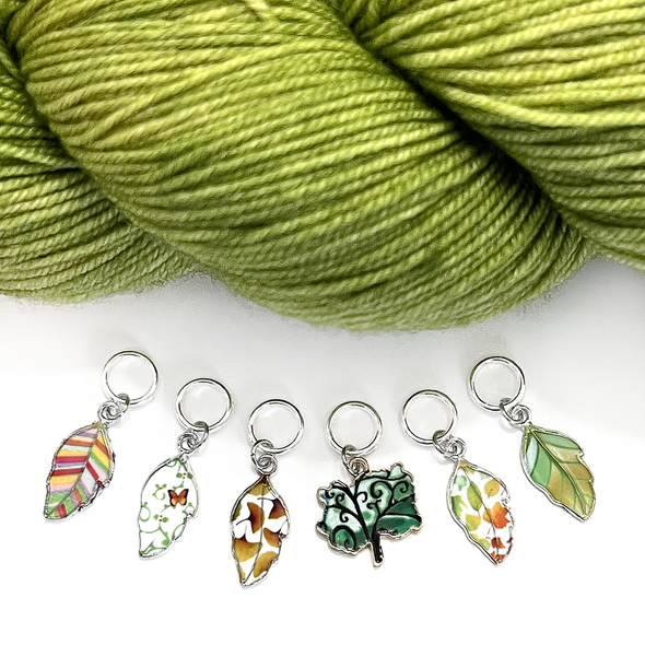 Set of six multi coloured enamel leaf and tree charms snag free ring stitch markers with yarn for knitting by Pretty Warm