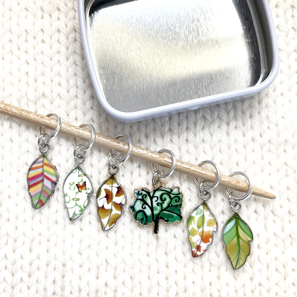 Set of six multi coloured enamel leaf and tree charms snag free ring stitch markers on needle with tin for knitting by Pretty Warm Designs
