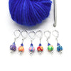 Set of six multi coloured flower beads, blue crystal beads, seed beads and silver plated lever back clasps stitch markers with hook and yarn for crochet by Pretty Warm Designs