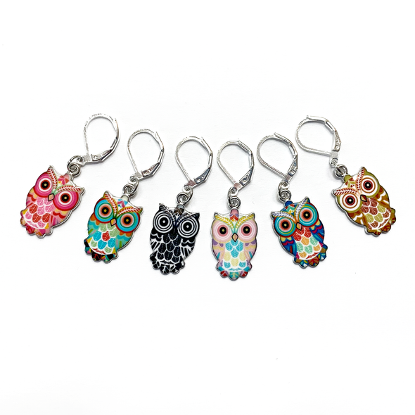 Set of six multicoloured enamel on silver toned alloy owl locking stitch markers for crochet by Pretty Warm Designs