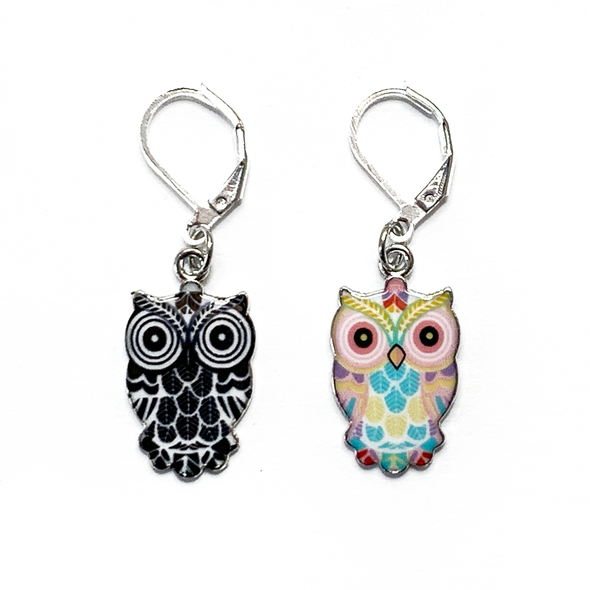Two multicoloured enamel on silver toned alloy owl locking stitch markers for crochet by Pretty Warm Designs