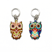 Two multi-coloured enamel owl charm snag free ring stitch markers for knitting by Pretty Warm Designs