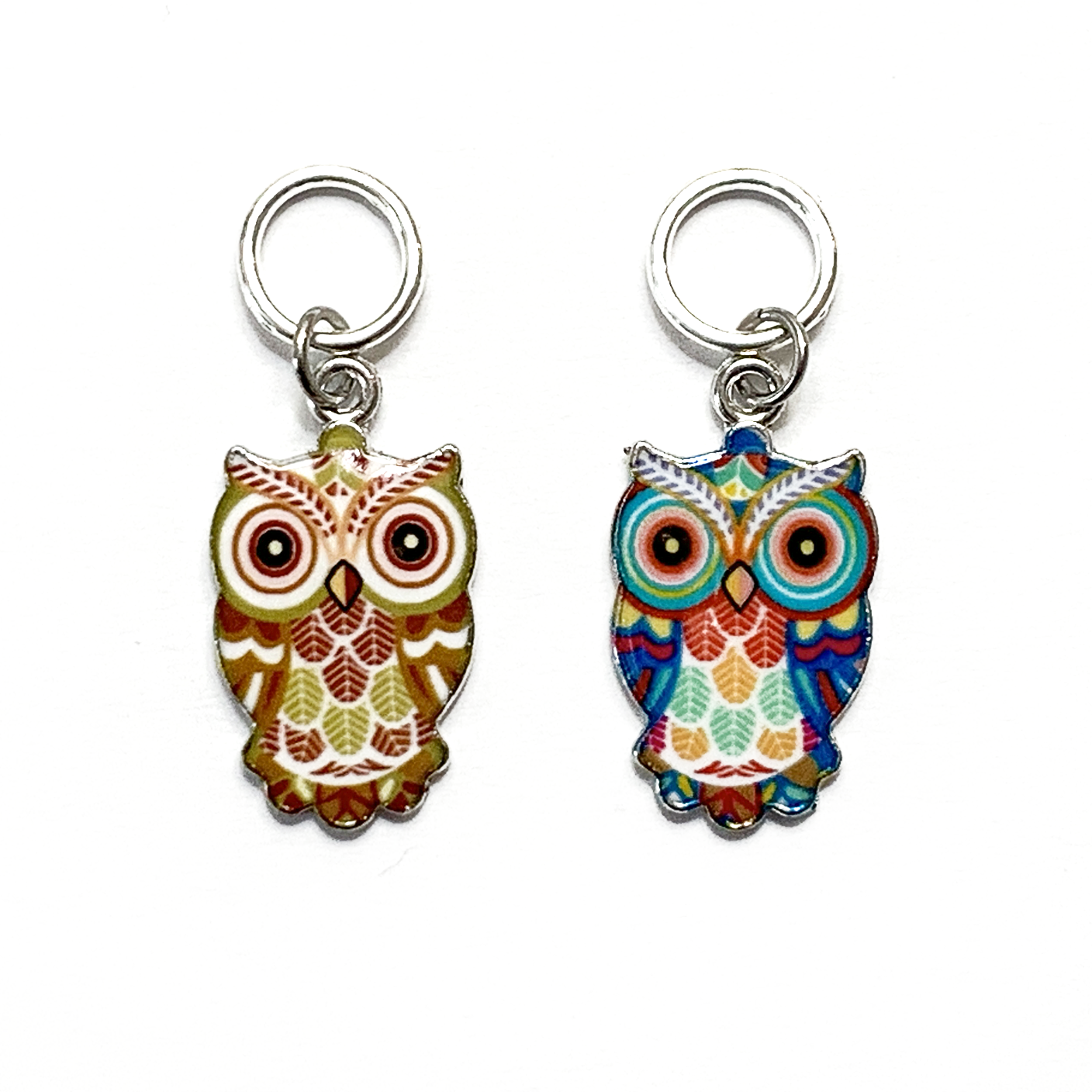 Two multi-coloured enamel owl charm snag free ring stitch markers for knitting by Pretty Warm Designs