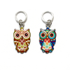 Two multi-coloured enamel owl charm snag free ring stitch markers for knitting by Pretty Warm Designs