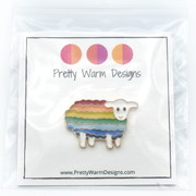 Packaged rainbow striped enamel on metal sheep pin by Pretty Warm Designs