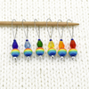Set of six snag free rainbow glass beads, faceted glass drop beads and blue seed beads on nylon coated wire, stitch markers on needle for knitting by Pretty Warm Designs