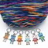 Set of six multi coloured enamel robot charms snag free ring stitch markers with yarn for knitting by Pretty Warm Designs