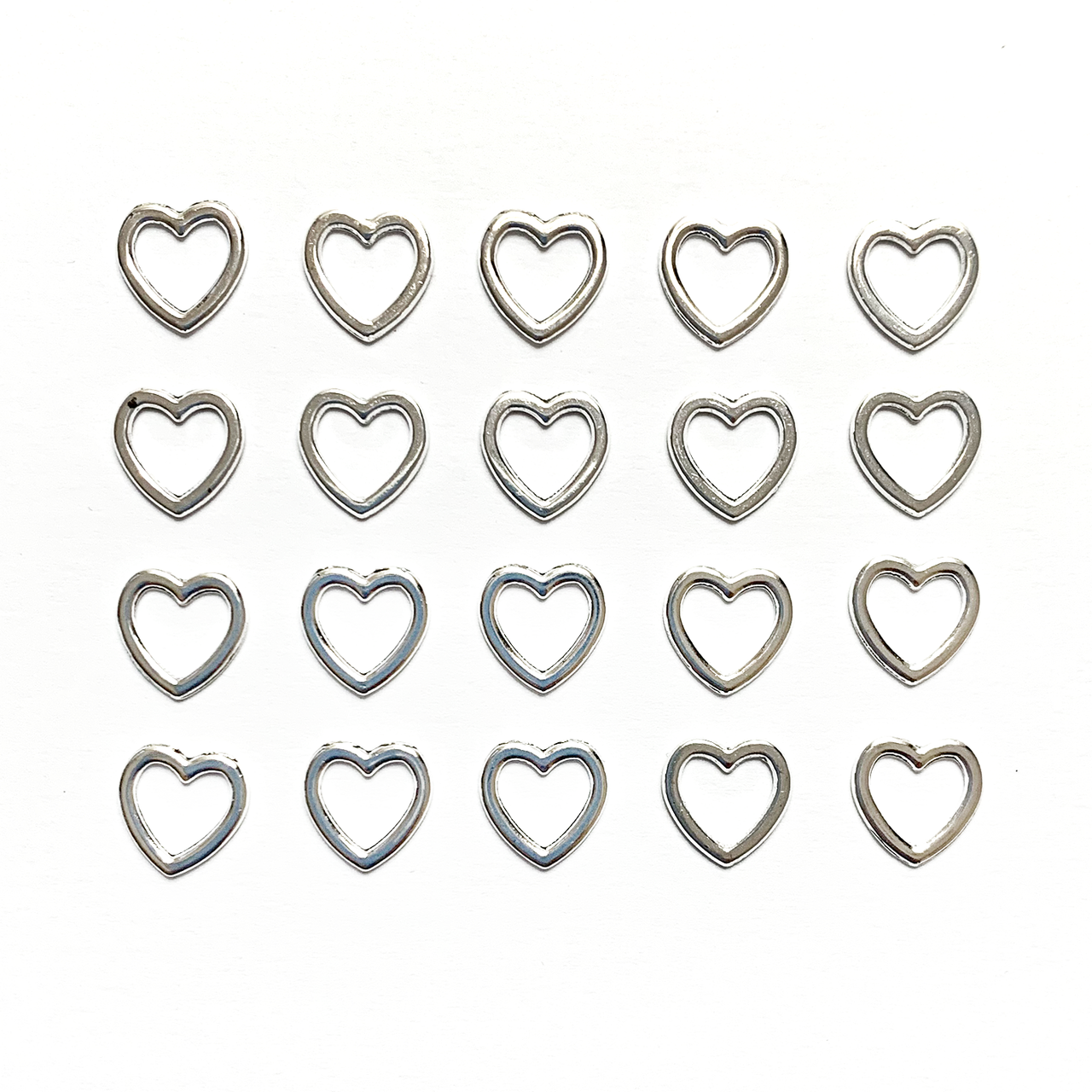 20 small heart stitch markers sold by Pretty Warm Designs Inc.