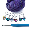 Set of six faceted cut glass multicoloured heart charms locking crochet stitch markers with crochet hook and purple variegated yarn by Pretty Warm Designs Inc.