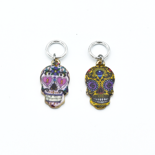 Two enamel sugar skull charms snag free ring stitch markers for knitting by Pretty Warm Designs